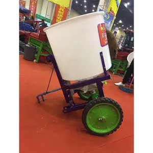 Electric grass seed spreader tractor mounted urea compound fertilizer spreader