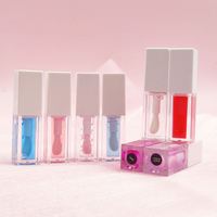 Huile repulpante pour les lèvres en gros, huile aromatisante végétalienne, marque privée, huile repulpante hydratante pour les lèvres, paillettes roses, huile à lèvres changeante de couleur