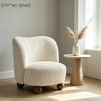 Fauteuil individuel de détente sur mesure en gros, chaise de salon luxueuse avec pieds en bois, style bouclé, pour hôtel et maison