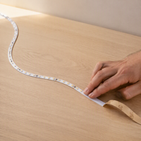 Bande LED Flexible 24V 2835 120 LED/m 10W/m 5mm 3000K Blanc Chaud Ra80 IP20 Télécommande Dimmable Coupable à 50mm Rouleau de 5m