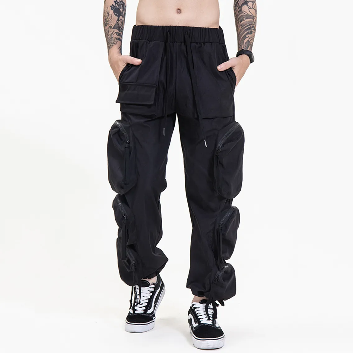 Pantaloni Cargo da uomo in stile ampio su misura Multi tascabile pantaloni Cargo sportivi intrecciati di colore Patchwork per uomo