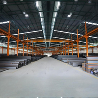 Entrepôt métallique préfabriqué à faible coût pour le stockage commercial d'inventaire, avec support technique personnalisé