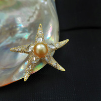 Broche de créateur unisexe en laiton plaqué or avec étoile de mer et perle d'eau douce, bijou de luxe tendance, cadeau pour femmes et enfants, idéal pour les fêtes