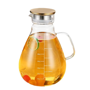 <span class=keywords><strong>Carafe</strong></span> en verre transparent durable et résistante à la chaleur avec poignée, écologique, pour servir de l'eau froide, du jus et des boissons à la maison ou au restaurant - Product Image 1