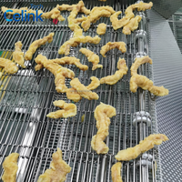 Ligne de production de friteuses continues pour nuggets de poulet, rouleaux de printemps, noix, usine de transformation d'aliments en collation