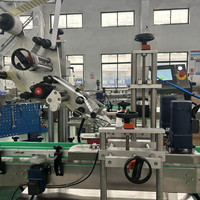 Machine automatique de bouchage et d'étiquetage de bouteilles en verre de whisky spiritueux à 4 têtes pour 250ml 500ml 750ml 1000ml