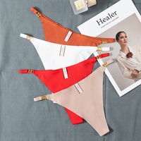 Sous-vêtements érotiques sexy de style européen et américain pour femmes, fines bretelles, boucle à anneau métallique, string taille basse, respirant, en nylon et coton, couleur chair