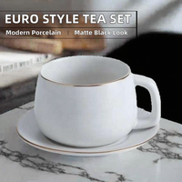 Ensemble tasse et soucoupe à café en porcelaine moderne isolée et écologique de 250 ml, finition or mat, pour la maison, le café et le thé de l'après-midi (vente en gros)