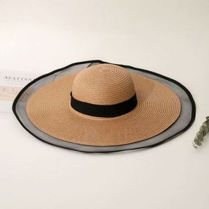 Zhejiang Wholesale Custom Mesh Trimmed Wide Brim Oversized <b>Straw</b> Visor <b>Hat</b> Beach <b>Hats</b> - Product Image 4