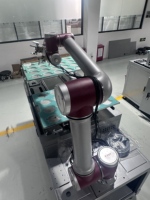 Station de manutention automatisée par robot de coopération homme-machine pour le chargement et le déchargement, bras robotique, machine de fraisage CNC pour ligne d'assemblage