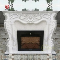 Cheminée personnalisée en pierre naturelle de luxe en marbre blanc italien entourée d'un manteau arqué