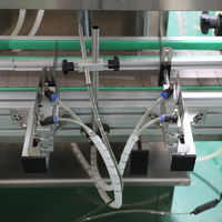 Machine de remplissage automatique à pompe magnétique à 4 têtes de haute précision pour flacons de cosmétiques liquides, d'huiles essentielles et de diffuseurs de parfum à bâtonnets