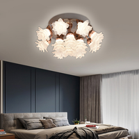 Lustre de salon en acrylique bronze en forme de fleur avec finition dorée LED, éclairage de style français à intensité variable