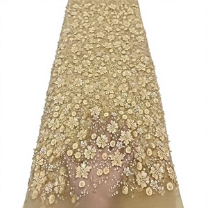 Tessuto in <span class=keywords><strong>Tulle</strong></span> <span class=keywords><strong>Ricamato</strong></span> con Perline e Paillettes Africane all'Ingrosso <span class=keywords><strong>per</strong></span> <span class=keywords><strong>Abiti</strong></span> da Sposa e da Sera - Product Image 1