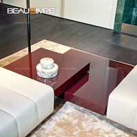 Table basse géométrique solide combinée avec miroir aimé table centrale enveloppante en acier inoxydable finition laquée pour moderne