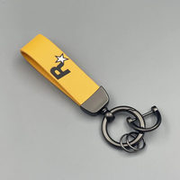 Porte-clés en cuir PU de qualité supérieure personnalisables en gros, cadeaux de marque d'entreprise pour les passionnés d'automobile avec anneaux de clés en métal
