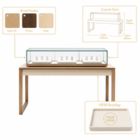 Vitrine de présentation de bijoux en verre et acier inoxydable avec éclairage LED, solutions écologiques complètes pour l'aménagement de magasins et salles d'exposition