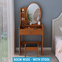 Coiffeuse de chambre moderne et minimaliste pour petits espaces, avec miroir coulissant, compartiments de rangement et un design élégant.