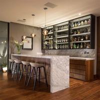 Comptoir de bar commercial éclairé en marbre au design moderne personnalisé pour restaurant, bar à vin et bar à jus