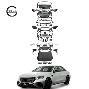 Kit de Carrocería W213 a W214 E63 para <span class=keywords><strong>Mercedes</strong></span> Benz Clase <span class=keywords><strong>E</strong></span> W213, Actualización a W214 E63 AMG, Parachoques Delantero y Trasero, Guardabarros, Capó, Faros LED, Parrilla - Product Image 1