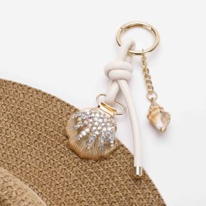 2025 nouvelle vente chaude Marine série sac breloques blanc PU corde coquille porte-clés mignon conque chapeau pince pour les femmes bijoux de mode - Product Image 1