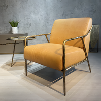 Fauteuil de loisirs individuel en fer forgé massif de style Mid-Century, avec revêtement en cuir ciré rétro et structure en métal forgé à la main
