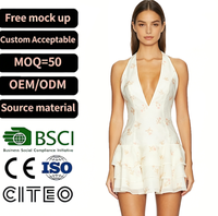 Robe mini blanche à imprimé floral pour femme, col halter, décolleté plongeant sexy, ourlet à volants, tenue de soirée, clubwear, robe d'été, robe de plage, mode