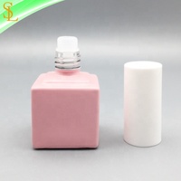 Vente en gros de bouteilles en verre de vernis à ongles en gel UV en forme de cube de 11ml rose fantaisie avec capuchon blanc lisse rond et pinceau plat