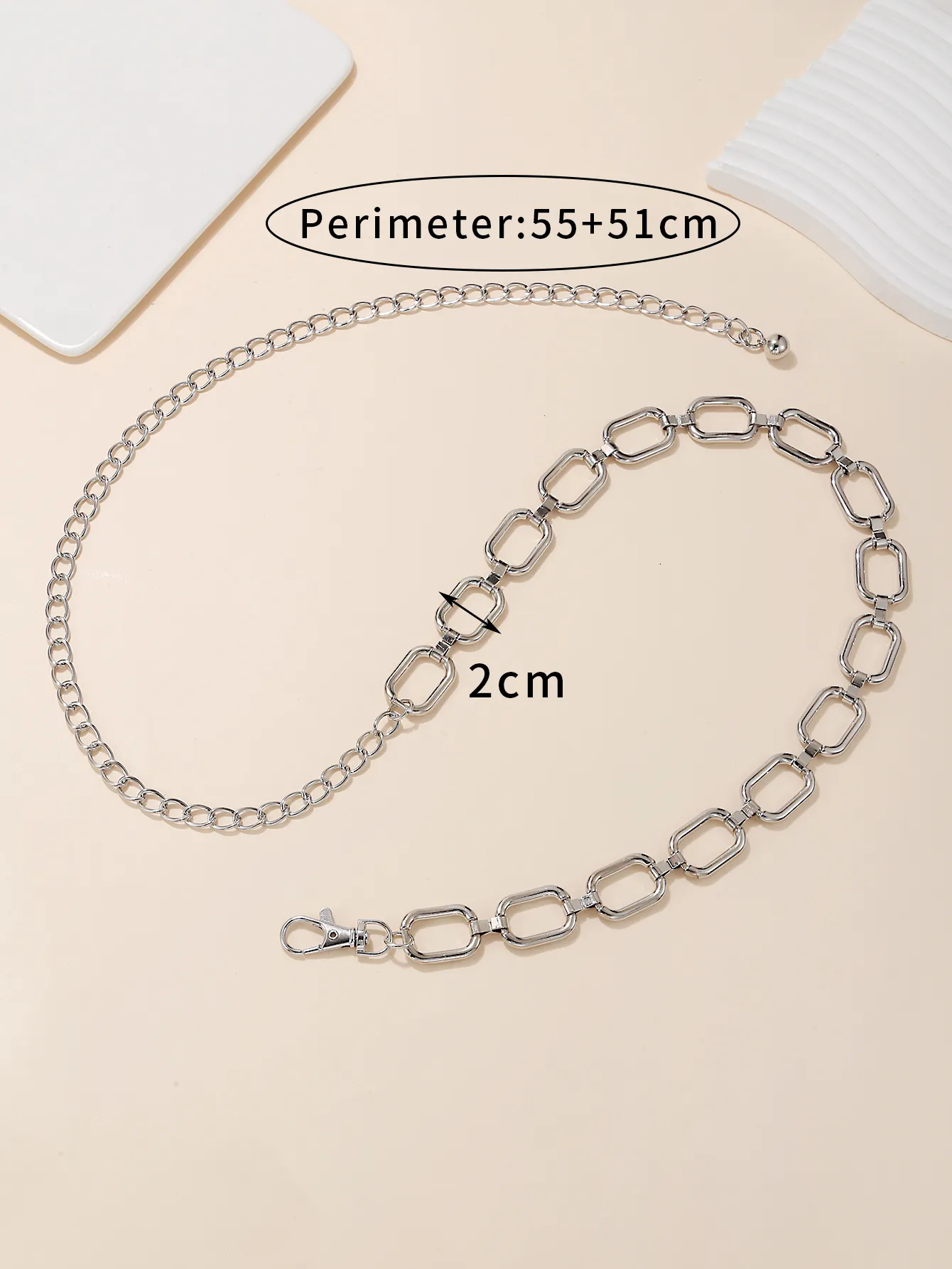 Nueva tendencia de moda de acero inoxidable forma ovalada cadena plateada cinturón para mujer