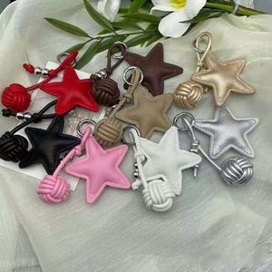 Llavero de piel sintética de alta calidad con forma de estrella, colgante para bolso, llavero para coche, decoración para libros, cadena de regalo - Product Image 5
