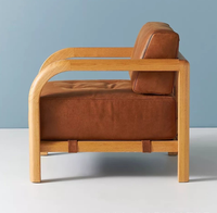 Massivholzrahmen Anpassbarer Moderner Akzentstuhl Beiges PU-Leder Kissen Gebogene Armlehne Wohnzimmer Einzelner Freizeitsitz Möbel