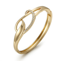 Bracelet minimaliste torsadé infini en cristal unique plaqué or fin, collection 2027 – Bracelets romantiques pour femme, vente en gros