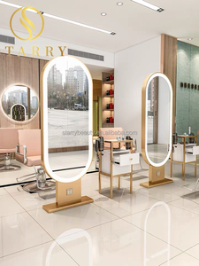 Miroir de coiffure ovale de luxe moderne et durable en fer avec éclairage LED et cadre doré pour hôtels et supermarchés - Product Image 4