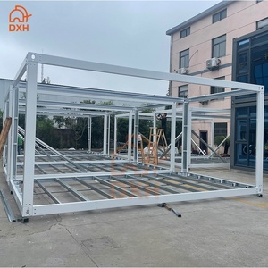 Estructura de Casa Contenedor Prefabricada Galvanizada Moderna para Exteriores, Personalizada por DXH, de 10 pies, 20 pies, 30 pies y 40 pies, en Venta - Product Image 1