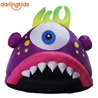 Collection de monstres gonflables géants : Crabe monstre aux yeux bleus et bouche orange, personnages mignons et colorés pour fêtes d'enfants, centres commerciaux