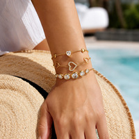 Bracelet OZE en acier inoxydable, motif cœur ajouré, entièrement orné de diamants, élégant et tendance pour femme de bureau, plaqué or 18 carats