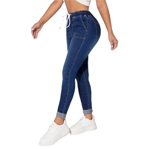 Jeans de mezclilla ajustados para mujer, estilo streetwear, novedad de primavera, con cordón elástico en la cintura y botones en los tobillos. - Product Image 2