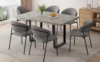Chaise de salle à manger moderne rembourrée en tissu gris avec dossier incurvé et pieds en métal, assise ergonomique pour cuisine et restaurant (vente en gros)