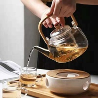 Grosir teko kaca Woyufen tahan panas dengan kaca Infuser bunga teko bambu