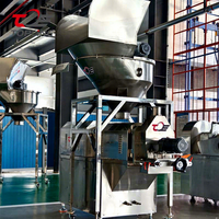 Machine de production d'aliments pour animaux de compagnie pressés à froid pour les régimes alimentaires crus et à basse température, avec aménagement de ligne et support de mise en marche