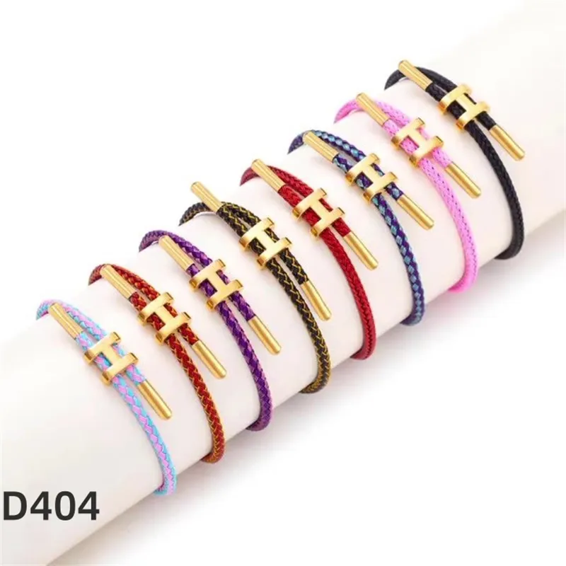 Bracelet en acier inoxydable de corde de fil tressé multicolore réglable de haute qualité pour les femmes et les hommes