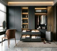 Dressing moderne gris foncé avec armoire intégrée, éclairage LED, coiffeuse et meuble de rangement sur mesure pour chambre à coucher