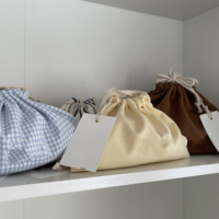 Pochette cosmétique écologique matelassée avec broderie de nœuds et fermeture éclair pour cosmétiques, accessoires capillaires, bijoux et petits essentiels quotidiens