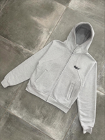 Ensemble de survêtement pour homme en molleton de coton gris chiné, comprenant un sweat à capuche oversize à fermeture éclair intégrale avec panneaux à coutures courbées et un pantalon de jogging coupe ballon