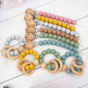 Nouveau produit bracelet <span class=keywords><strong>de</strong></span> <span class=keywords><strong>dentition</strong></span> en bois naturel pour bébé avec <span class=keywords><strong>anneau</strong></span> en silicone développement des compétences sensorielles pour les bébés <span class=keywords><strong>de</strong></span> <span class=keywords><strong>dentition</strong></span> - Product Image 5