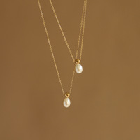 Collier vintage en forme de flacon de parfum à la mode, perle d'eau douce, chaîne de clavicule, acier titane plaqué or 18 carats, pendentif