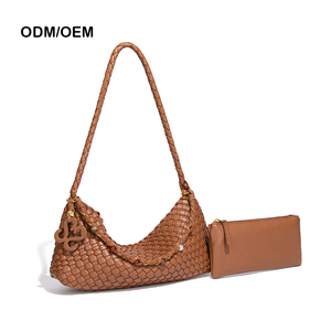 กระเป๋าถือสะพายไหล่หนัง PU ทอแบบ ODM OEM สำหรับผู้หญิง คุณภาพสูง ทันสมัย แฟชั่น กระเป๋าทรง Dumpling  ปรับแต่งได้ตามต้องการ - Product Image 1