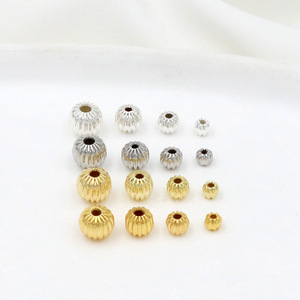 Accessoires de bracelet DIY : Perles citrouille à rayures verticales plaquées or 18 carats, Perles melon d'eau rondes creuses couleur or 14 carats inaltérable - Product Image 1