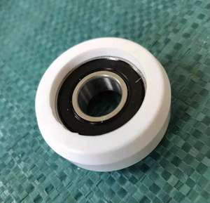 Ruota a rulli in Nylon di plastica lavorata a Cnc OEM con cuscinetto a sfere e anello di sicurezza - Product Image 5