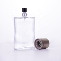 Bouteilles de parfum en verre à pompe à sertir à capuchon mat de 100mL à épaule plate avec courbe